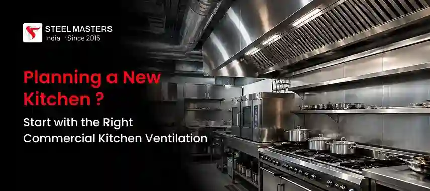 Commercial kitchen with stainless steel appliances and ventilation, promoting proper commercial kitchen ventilation planning.
